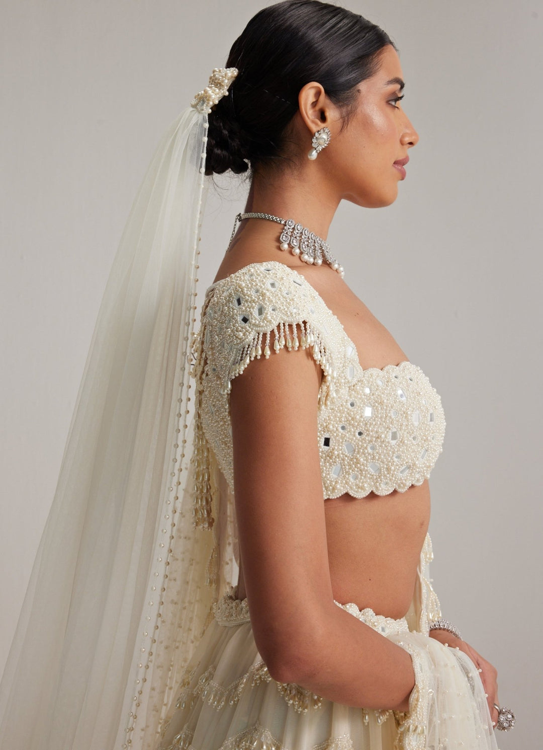 Ivory Mirror And Pearl Embroidered Bridal Lehenga With Veil Vvani by Vani Vats - Fabilicious Fashion