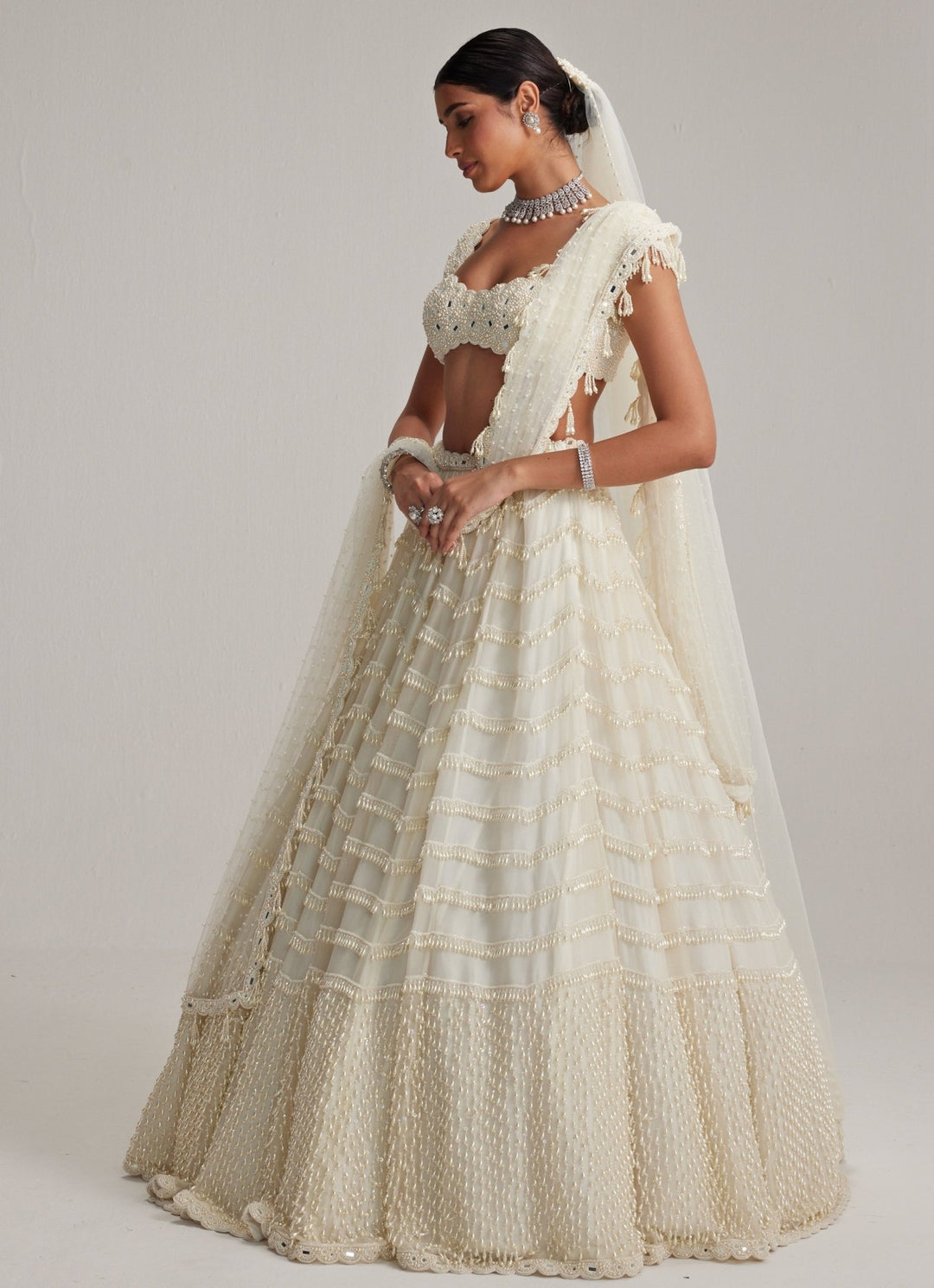 Ivory Mirror And Pearl Embroidered Bridal Lehenga With Veil Vvani by Vani Vats - Fabilicious Fashion