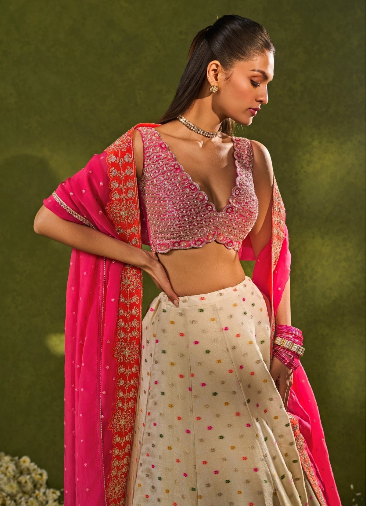 Ivory multicolour tissue lehenga with curved blouse neckline by Chamee and Palak
