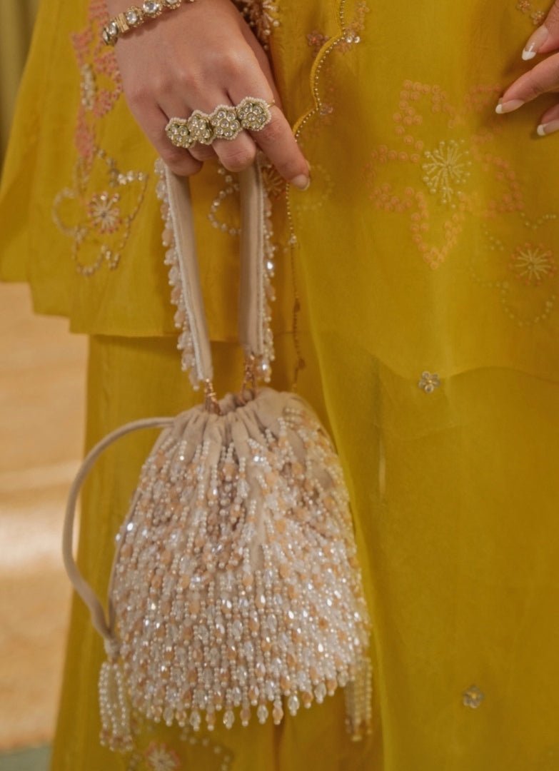 Ivory Pastel Suede Embellished Bucket Bag House of Kosha - Fabilicious Fashion