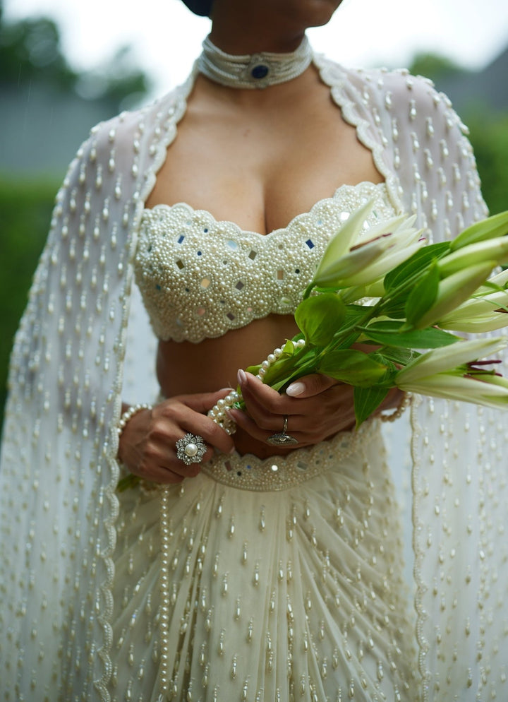 Ivory Pearl Embroidered Drape Skirt Set With Tassels Vvani by Vani Vats - Fabilicious Fashion