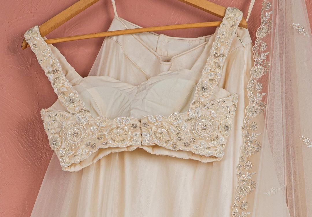 Ivory Pearl Embroidered Organza Lehenga Anisha Shetty - Fabilicious Fashion