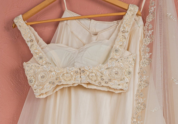 Ivory Pearl Embroidered Organza Lehenga Anisha Shetty - Fabilicious Fashion
