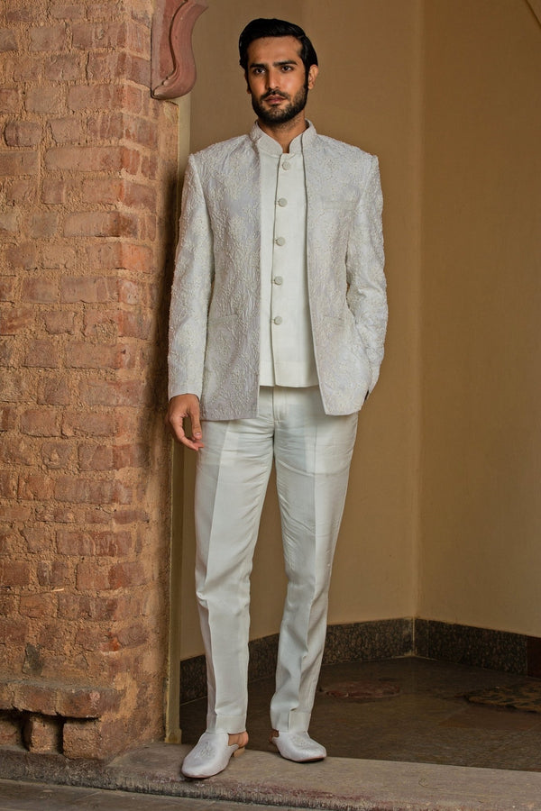 Ivory raw silk Nehru jacket set by Nitika Gujral Men for the father of the bride in a coordinated family palette