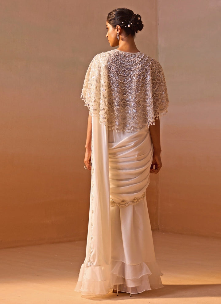 Nitika Gujral Ivory Satin Pre Draped Saree With CapeFabilicious Fashion