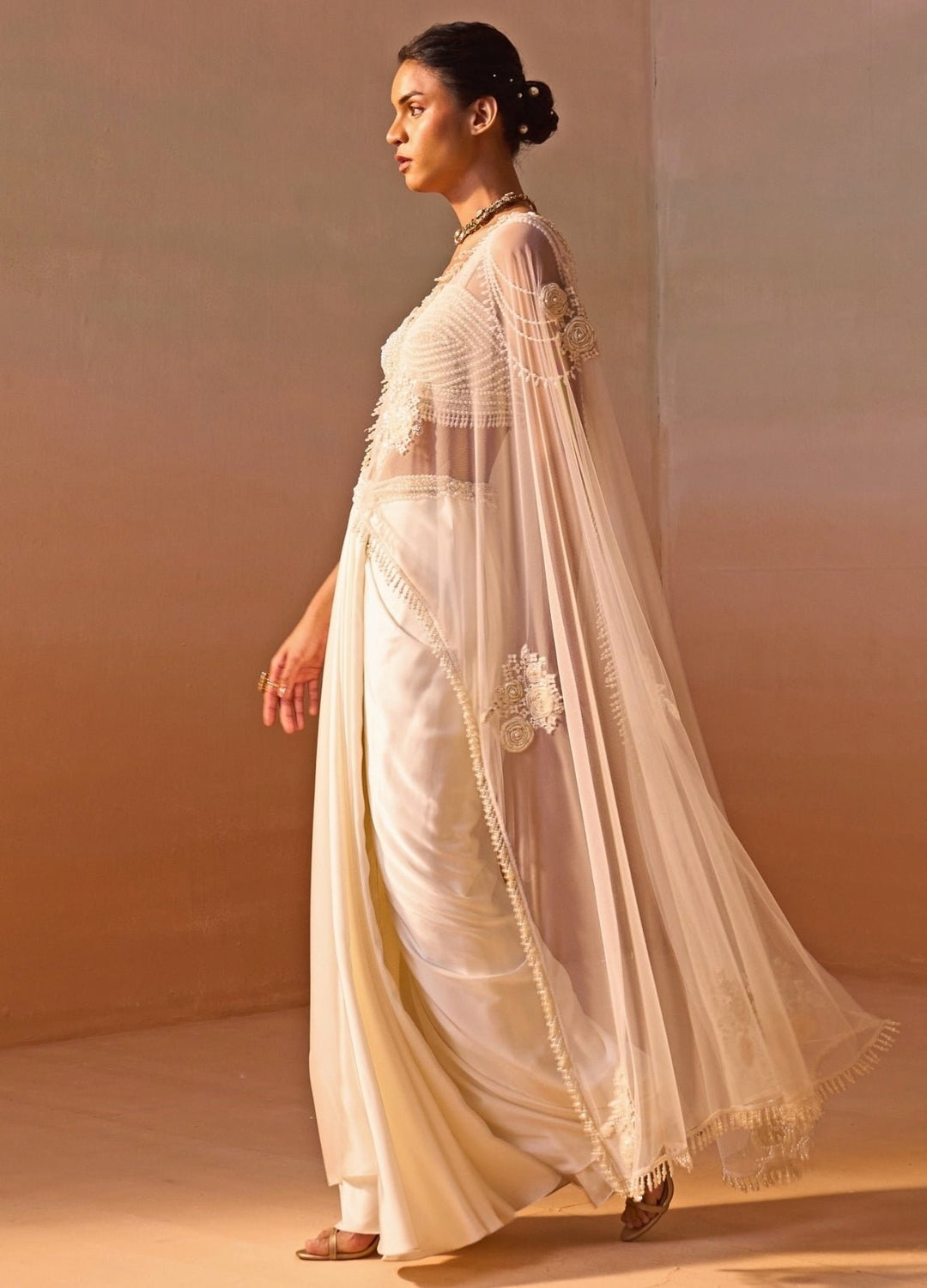 Nitika Gujral Ivory Satin Pre-Draped Saree With Pearl BustierFabilicious Fashion