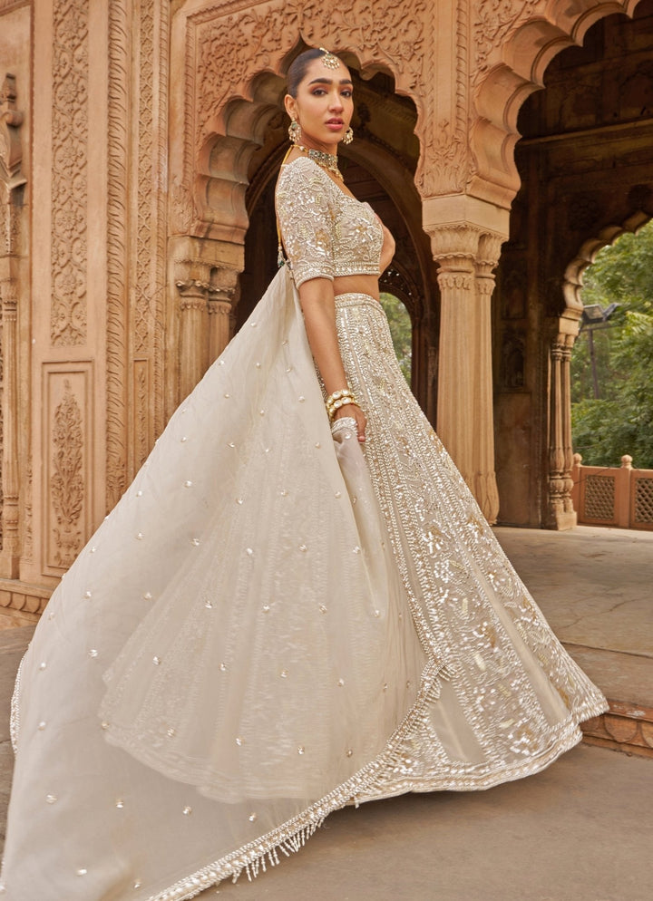 Ivory Sequin Embroidered Organza Lehenga Set Nidhika Shekhar - Fabilicious Fashion