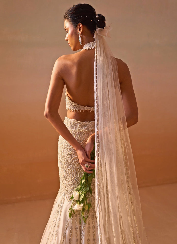 Nitika Gujral Ivory Soft Net Mermaid Lehenga Set With Halter BlouseFabilicious Fashion