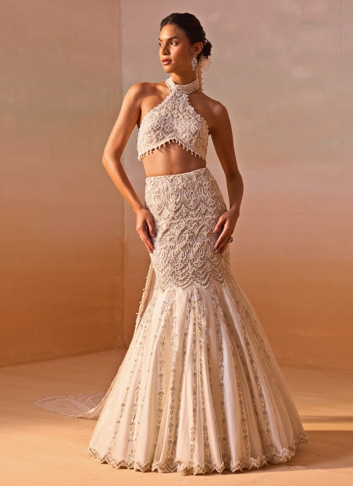 Nitika Gujral Ivory Soft Net Mermaid Lehenga Set With Halter BlouseFabilicious Fashion
