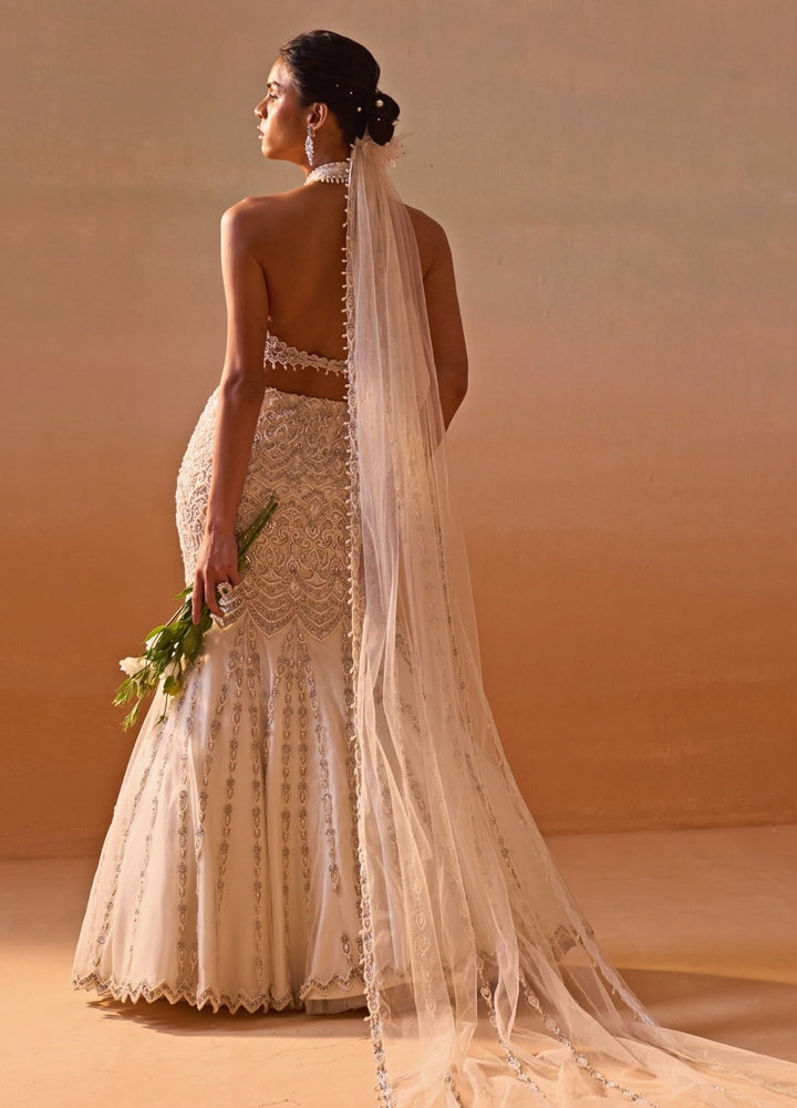 Nitika Gujral Ivory Soft Net Mermaid Lehenga Set With Halter BlouseFabilicious Fashion