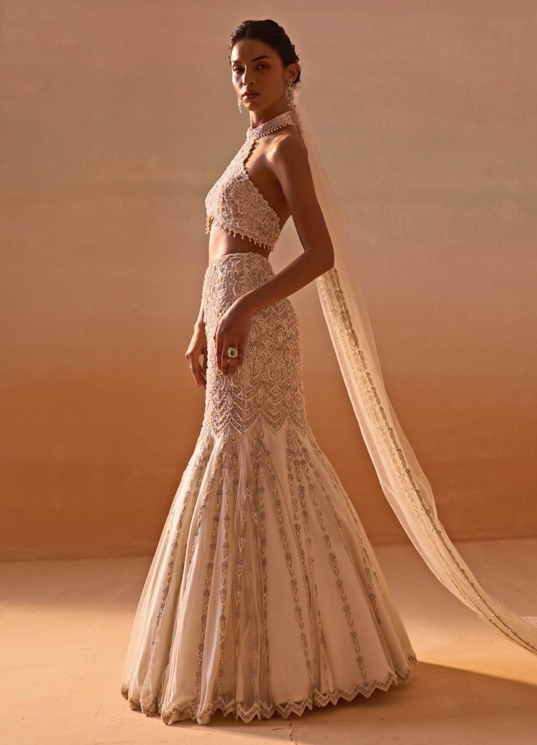 Nitika Gujral Ivory Soft Net Mermaid Lehenga Set With Halter BlouseFabilicious Fashion