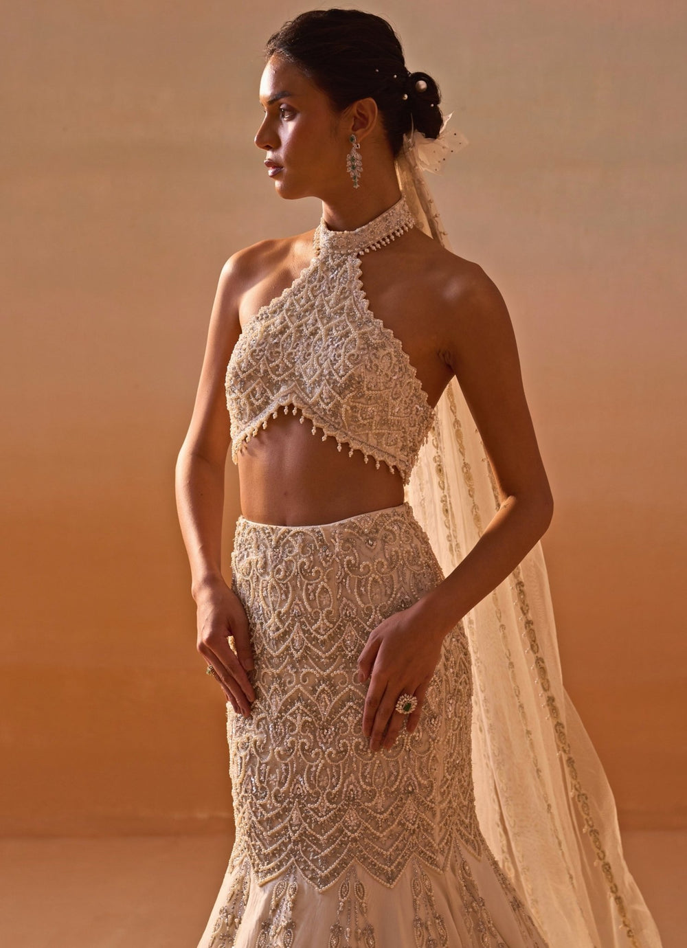 Nitika Gujral Ivory Soft Net Mermaid Lehenga Set With Halter BlouseFabilicious Fashion