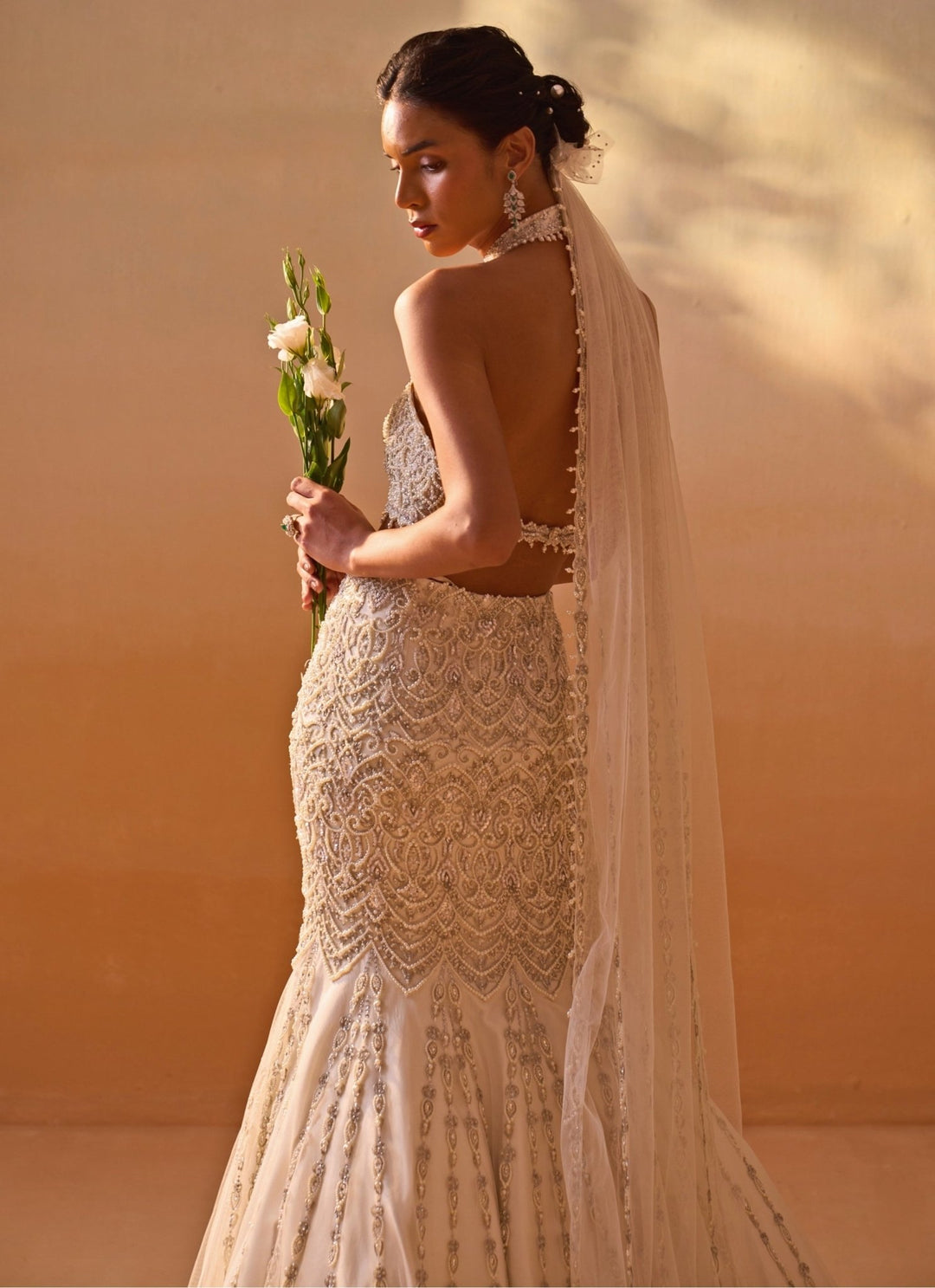 Nitika Gujral Ivory Soft Net Mermaid Lehenga Set With Halter BlouseFabilicious Fashion