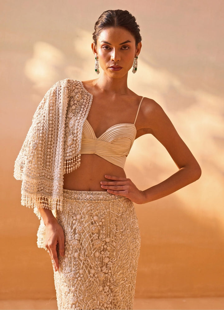 Nitika Gujral Ivory Soft Net Mermaid Trail Skirt Set With JacketFabilicious Fashion