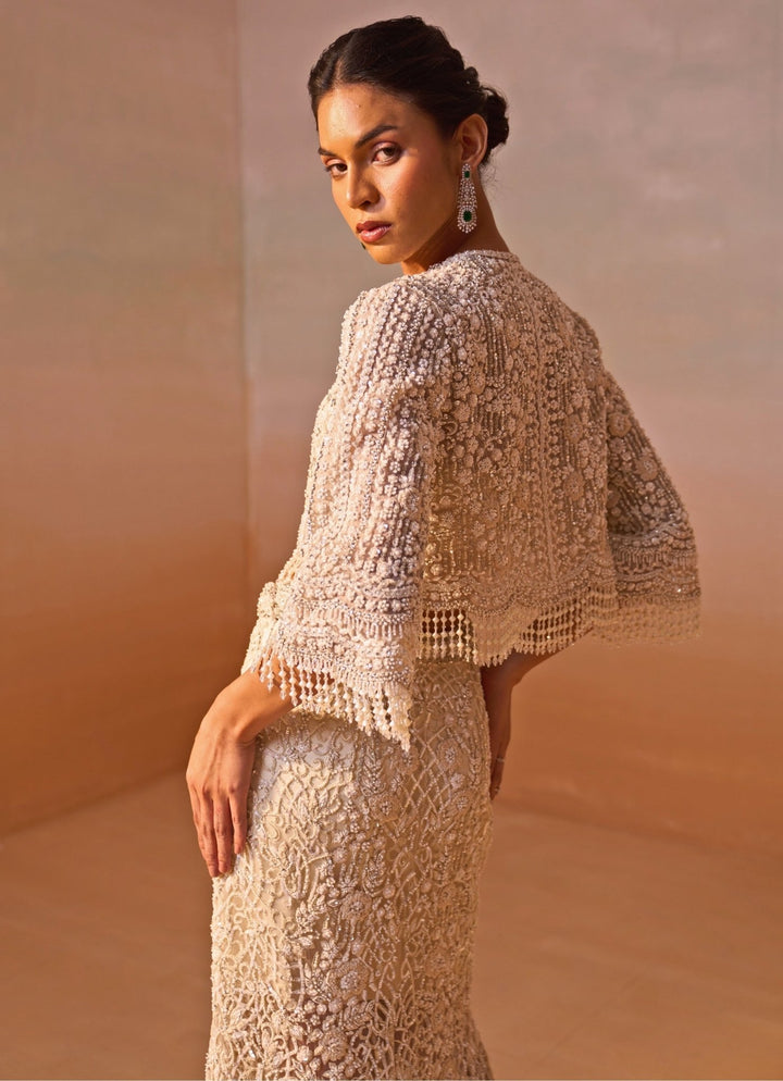 Nitika Gujral Ivory Soft Net Mermaid Trail Skirt Set With JacketFabilicious Fashion
