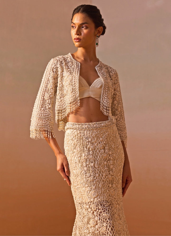Nitika Gujral Ivory Soft Net Mermaid Trail Skirt Set With JacketFabilicious Fashion