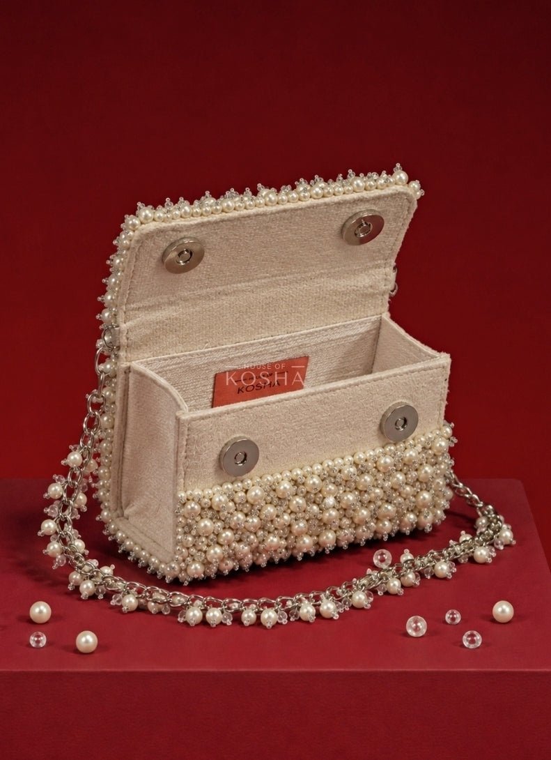 House of Kosha Ivory Suede Pearl Embellished Mini BagFabilicious Fashion