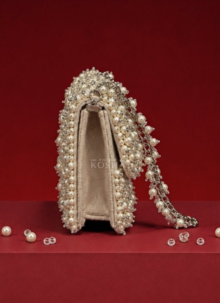 House of Kosha Ivory Suede Pearl Embellished Mini BagFabilicious Fashion