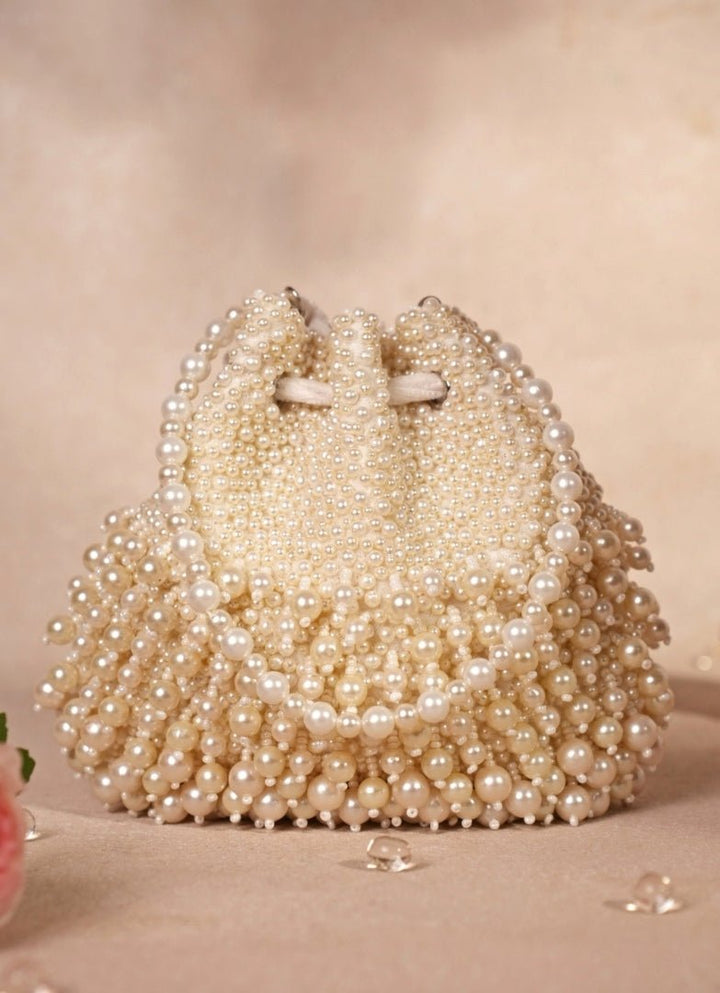 Ivory Suede Pearl Embellished Potli House of Kosha - Fabilicious Fashion