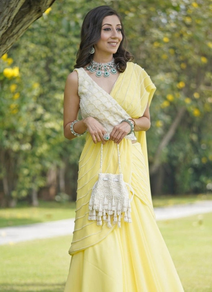 Ivory Suede Pearl Embellished Potli House of Kosha - Fabilicious Fashion