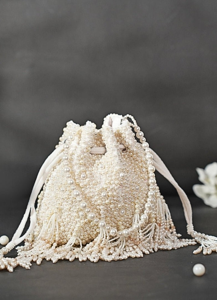 Ivory Suede Pearl Embellished Potli House of Kosha - Fabilicious Fashion