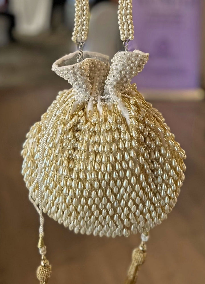 Ivory Suede Potli With Pearl Gold Hanging House of Kosha - Fabilicious Fashion