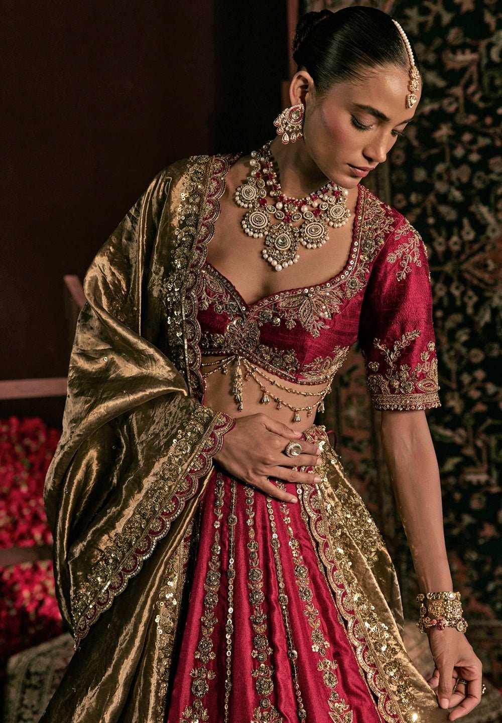 Prevasu bridal lehenga in maroon red brocade silk for a classic modern bride