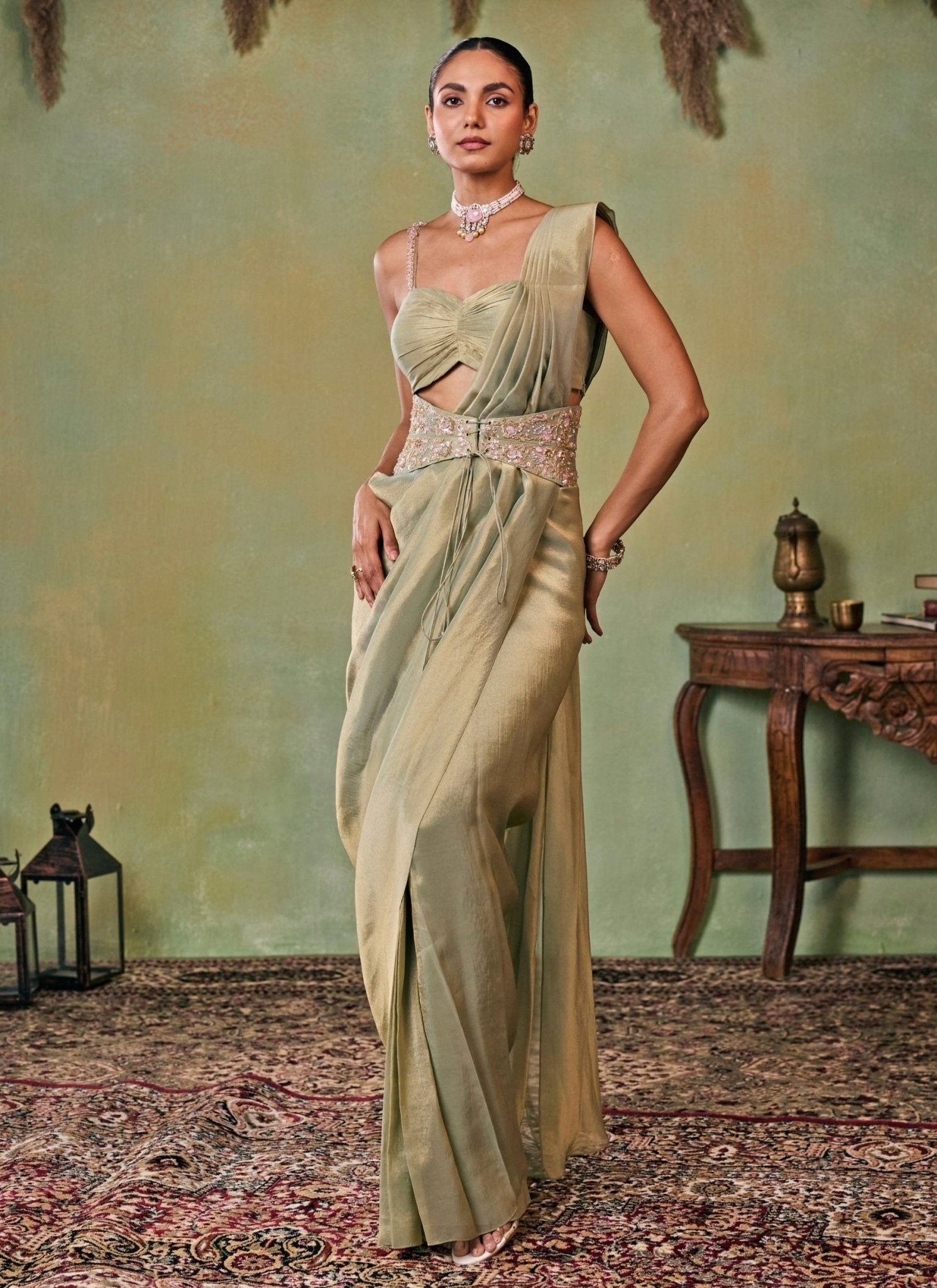 Metallic green tissue pre-draped saree with corset belt by Seema Thukral — modern saree for first-time wearer