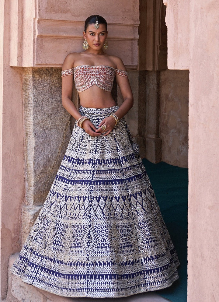 Angad Singh Midnight Blue And Orange Raw Silk Lehenga SetFabilicious Fashion