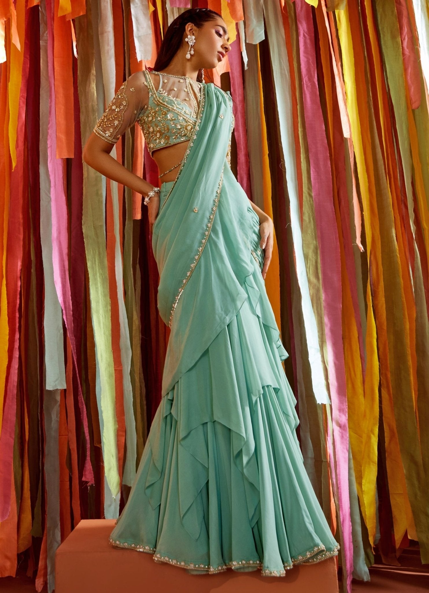 High neck sheer saree blouse 2026 — mint green ruffle saree, Sanya Gulati, Fabilicious Fashion