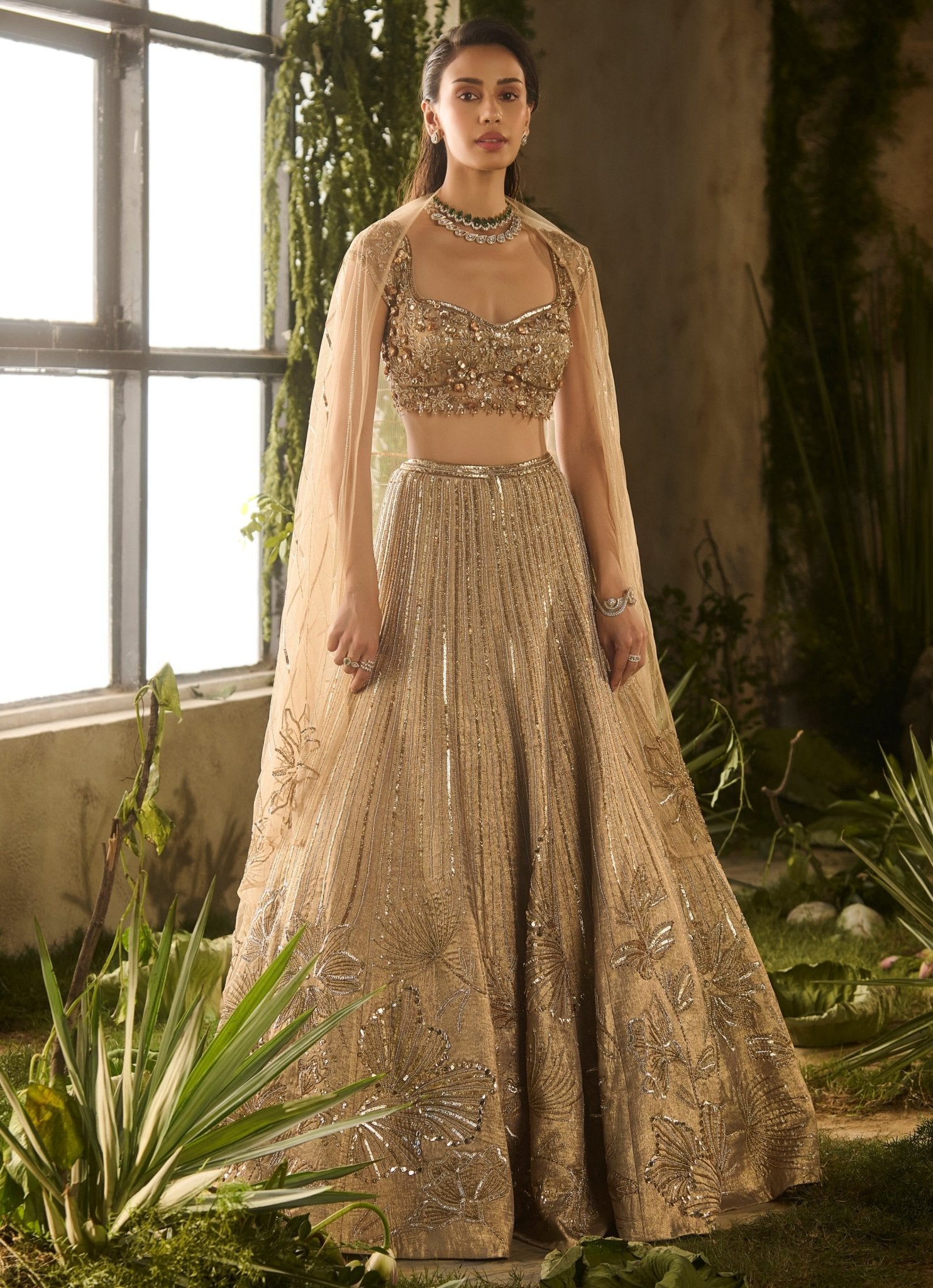 Molten gold sequinned silk lehenga for brother or sister wedding