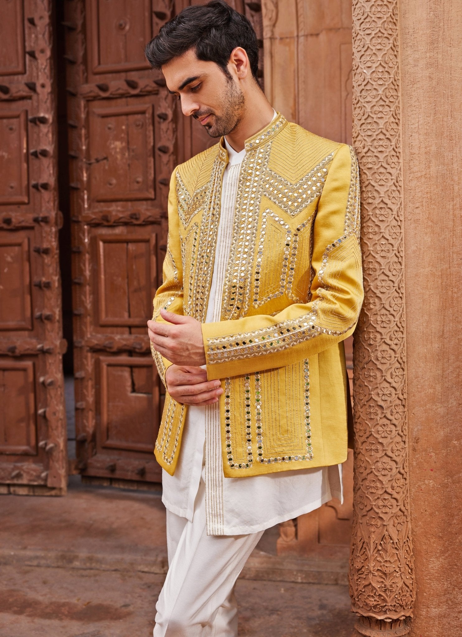 Mustard yellow mirror embroidered jacket set by Contrast by Parth, a men’s mehendi outfit