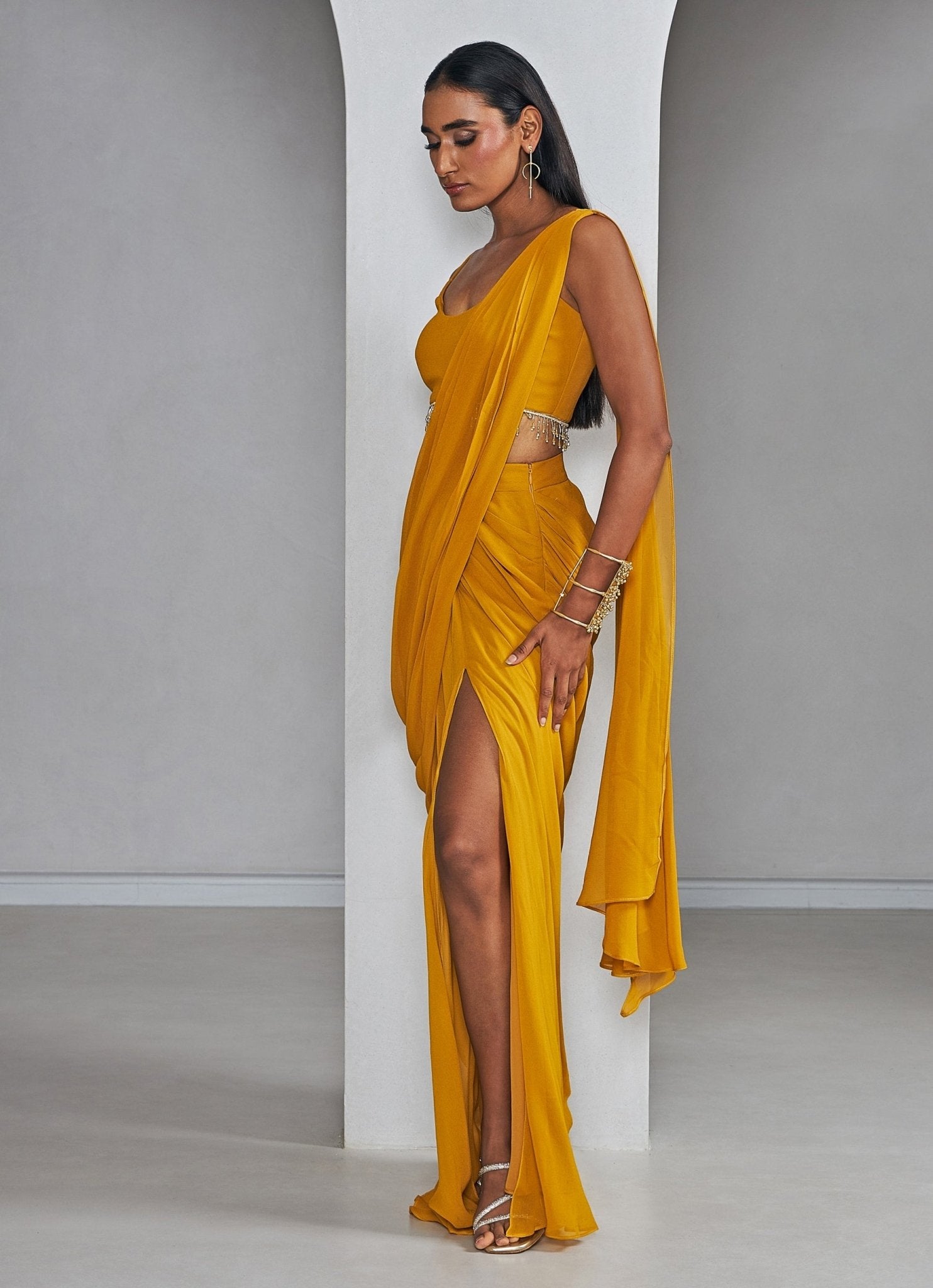 Mustard yellow slit saree — modern indo western trends 2026 for cocktail and festive wear