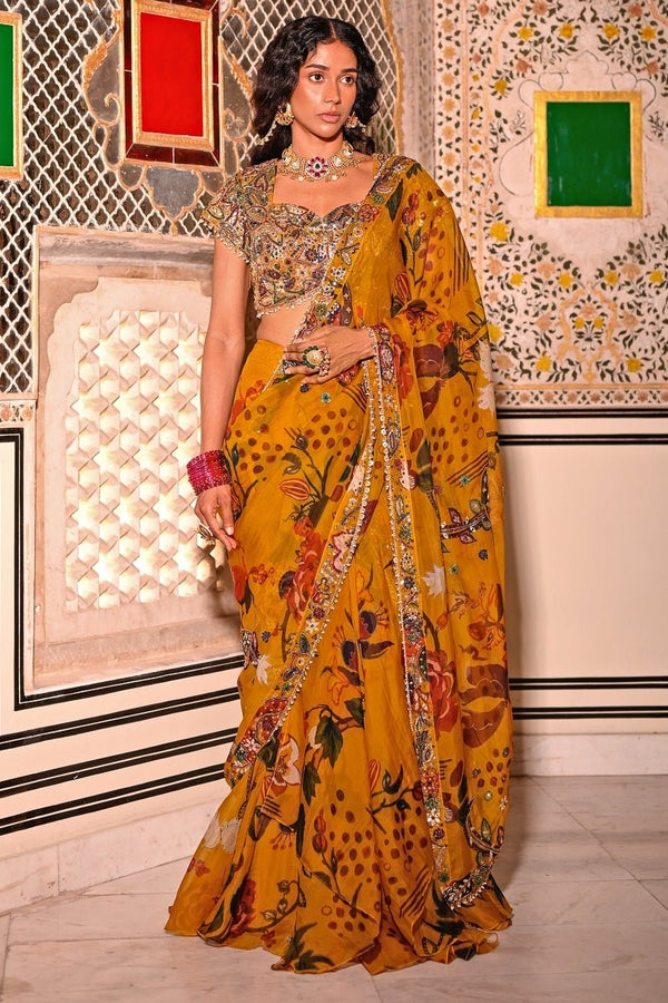 Juhi Bengani mustard yellow printed organza pre-draped saree for a haldi or mehendi