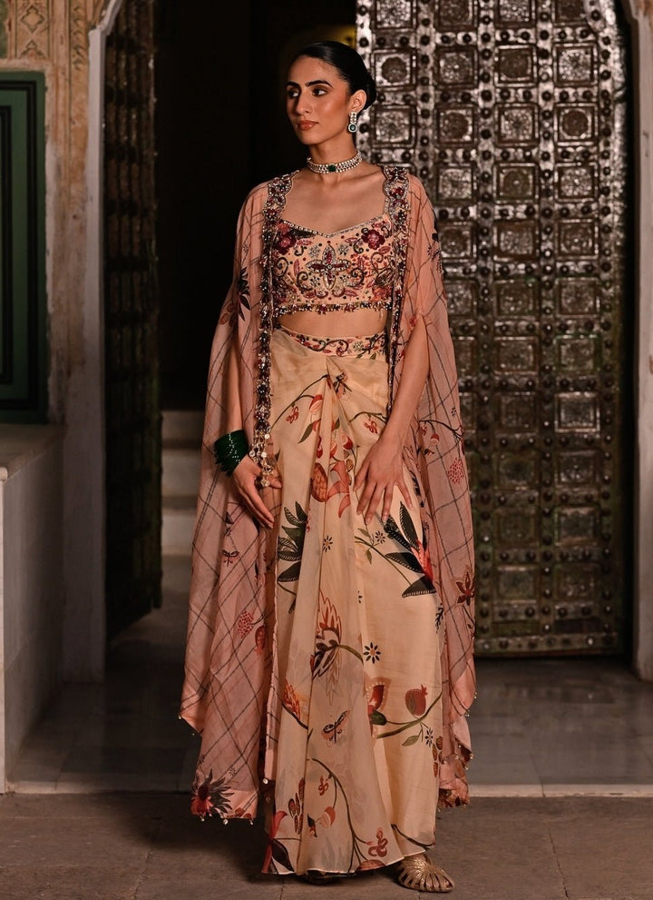 Juhi Bengani Muted Beige Pink Printed Organza Cowl Skirt Set With CapeFabilicious Fashion