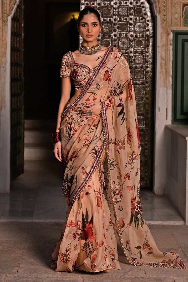 Juhi Bengani muted beige printed organza pre-draped saree for a day wedding