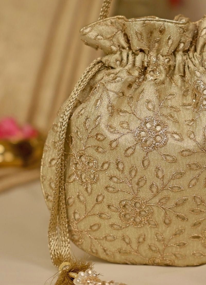 Amyra Muted Gold Embroidered Tissue PotliFabilicious Fashion