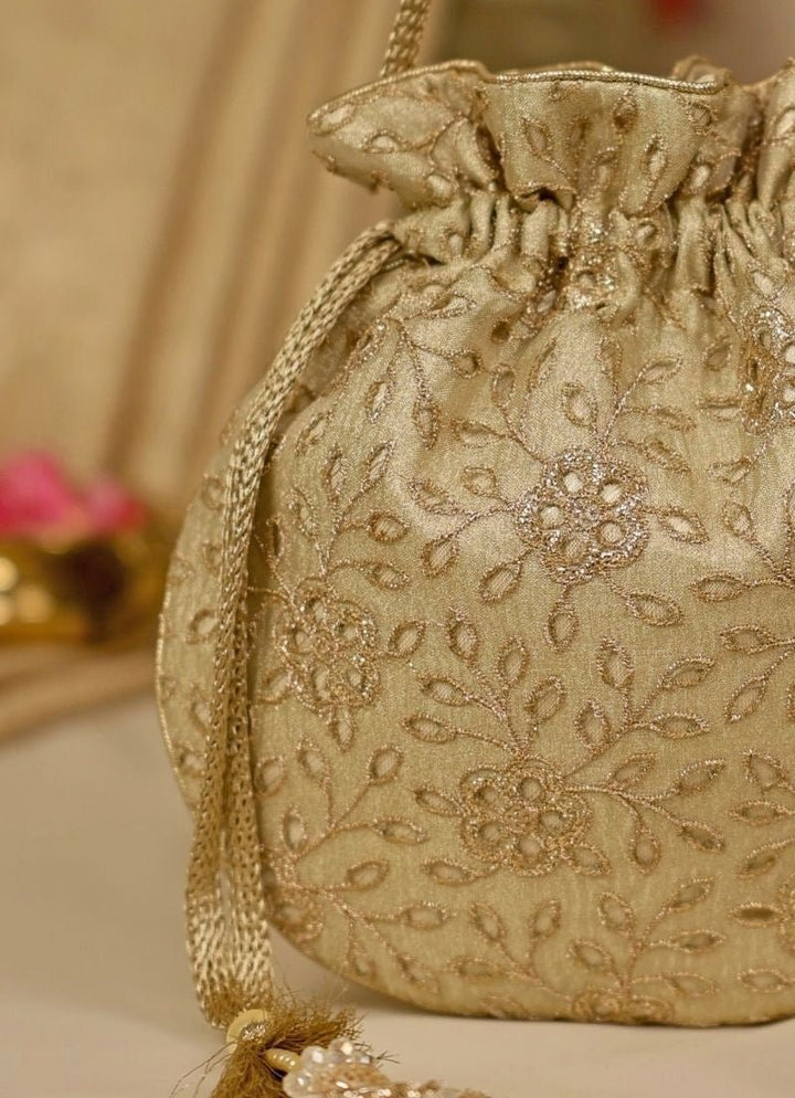 Amyra Muted Gold Embroidered Tissue PotliFabilicious Fashion