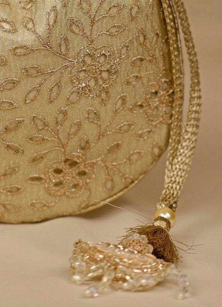 Amyra Muted Gold Embroidered Tissue PotliFabilicious Fashion