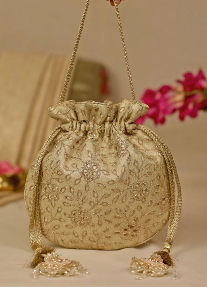 Amyra Muted Gold Embroidered Tissue PotliFabilicious Fashion