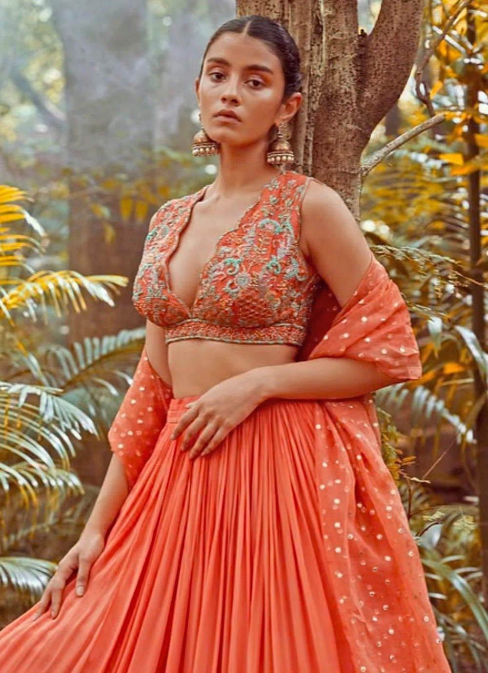 Fabilicious Fashion Muted Coral Orange Embroidered LehengaFabilicious Fashion