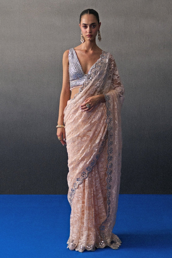 Muted peach embroidered lace saree for meeting his family