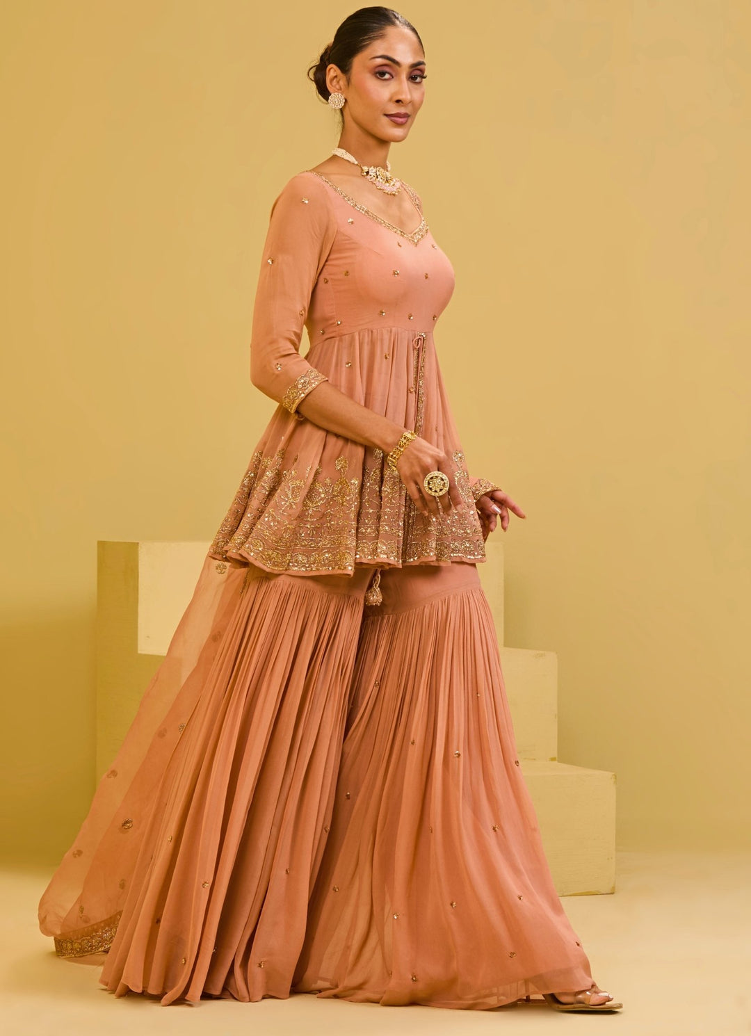 Esha Koul Muted Peach Georgette Peplum Kurta Sharara SetFabilicious Fashion