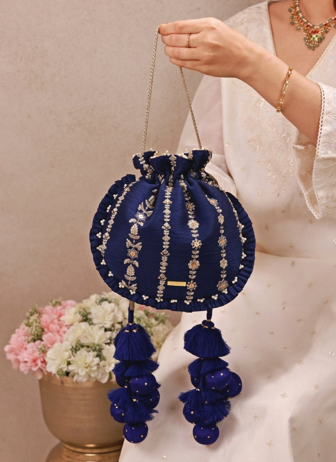 Amyra Navy Blue Embroidered Silk Pleated PotliFabilicious Fashion