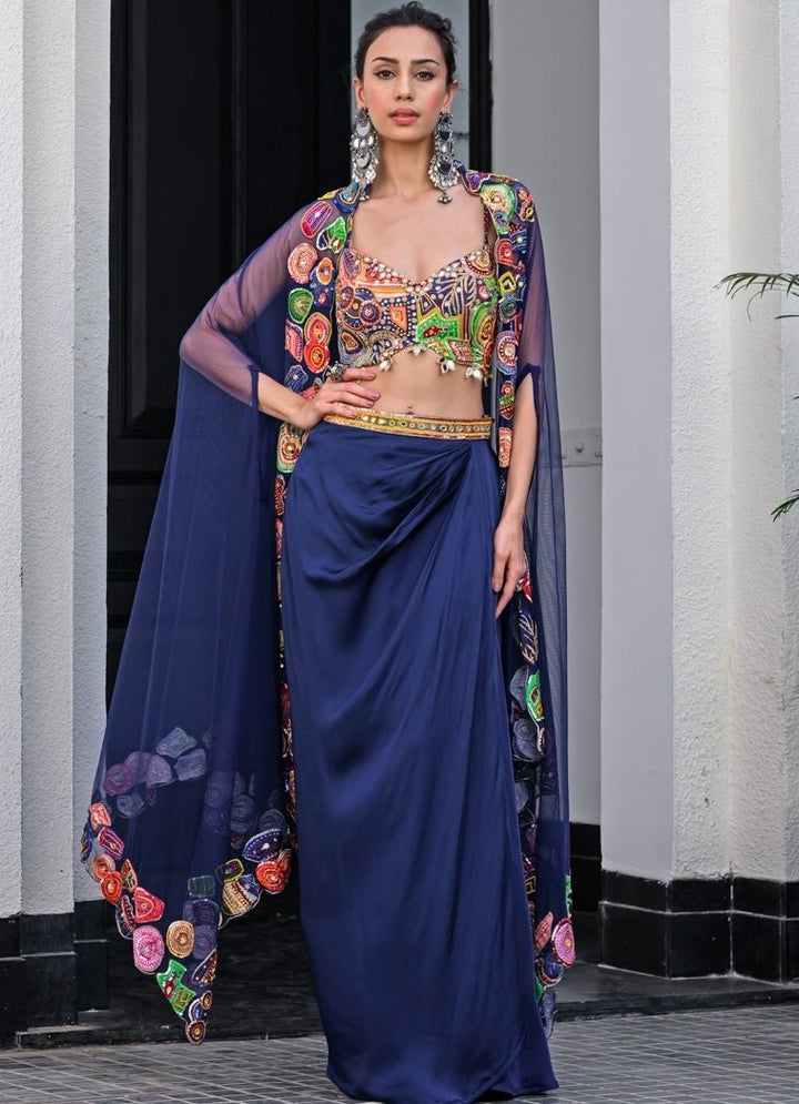Navy Blue Satin Dhoti Skirt With Embroidered Blouse And Cape Juhi Bengani - Fabilicious Fashion