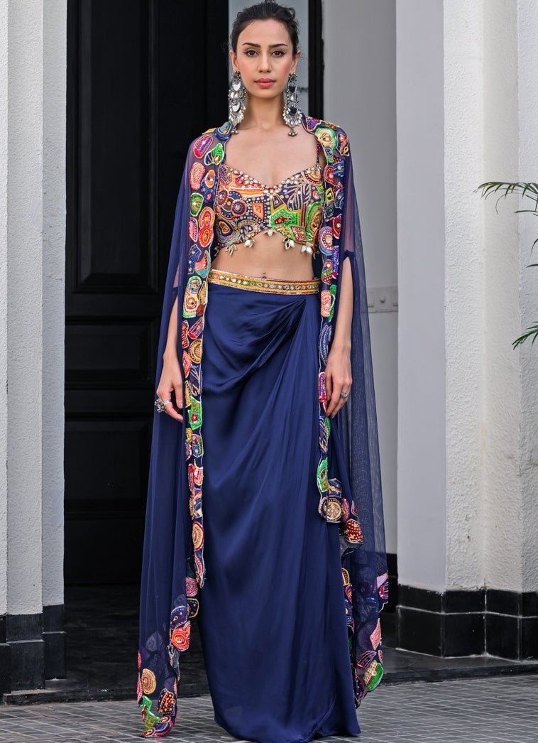 Navy Blue Satin Dhoti Skirt With Embroidered Blouse And Cape Juhi Bengani - Fabilicious Fashion