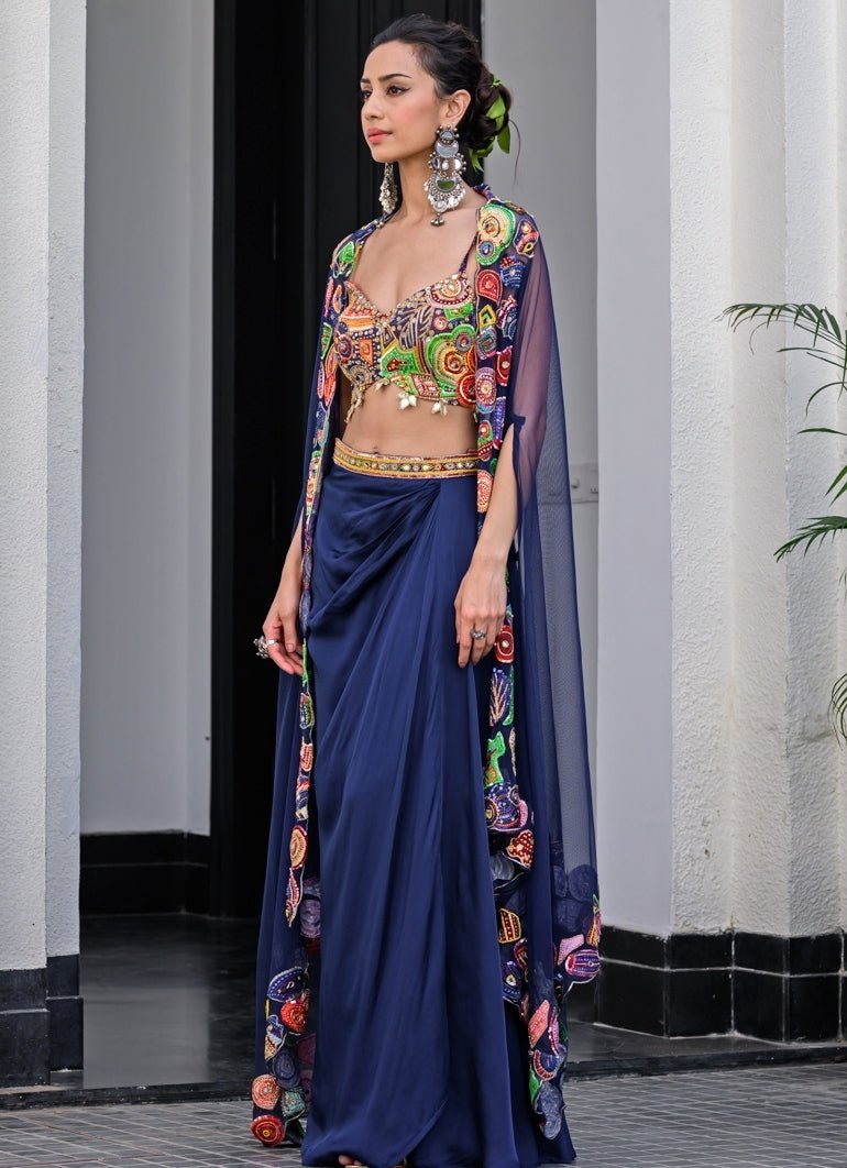 Navy Blue Satin Dhoti Skirt With Embroidered Blouse And Cape Juhi Bengani - Fabilicious Fashion