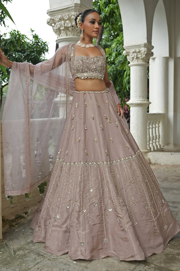 Nude beige embroidered silk lehenga set for a London wedding reception