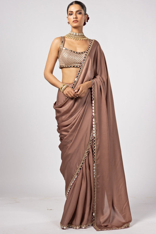 Nude gold embroidered satin saree with embroidered blouse by Vvani by Vani Vats