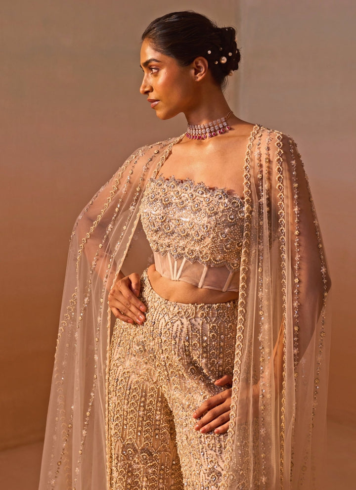 Nitika Gujral Nude Gold Soft Net Corset Pants Set With Cape DupattaFabilicious Fashion